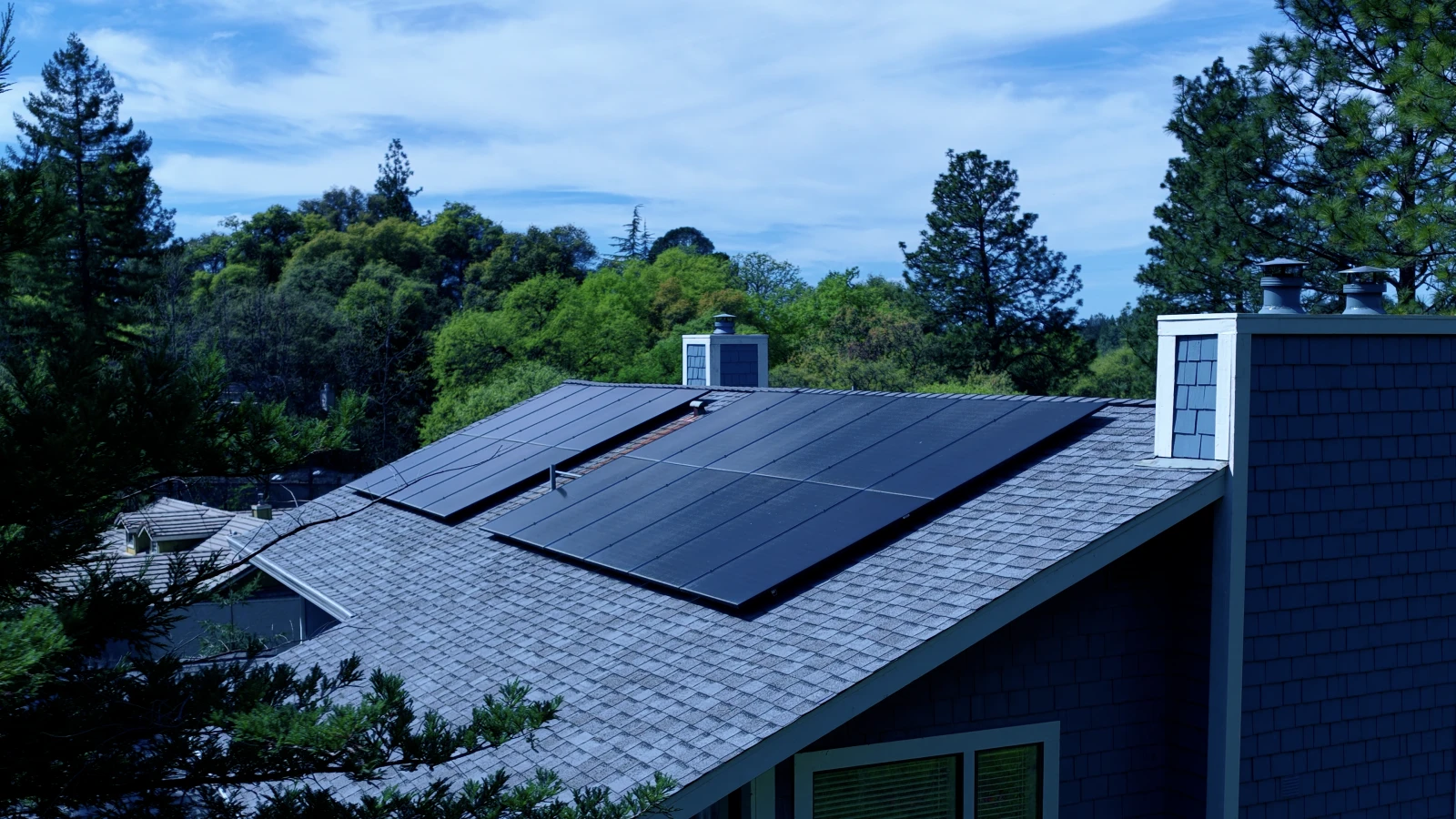 Solar technician servicing a rooftop system
